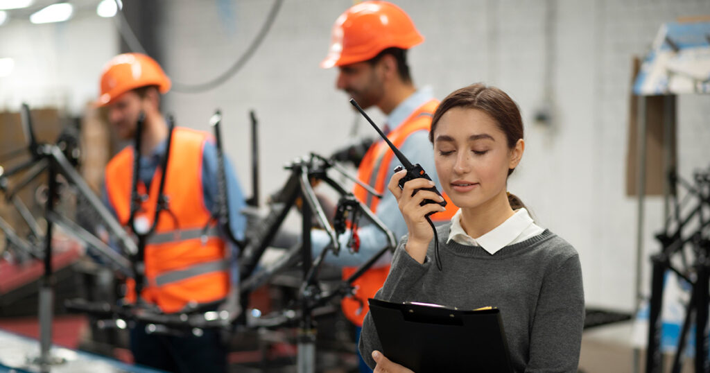 People in safety equipment at their workplace